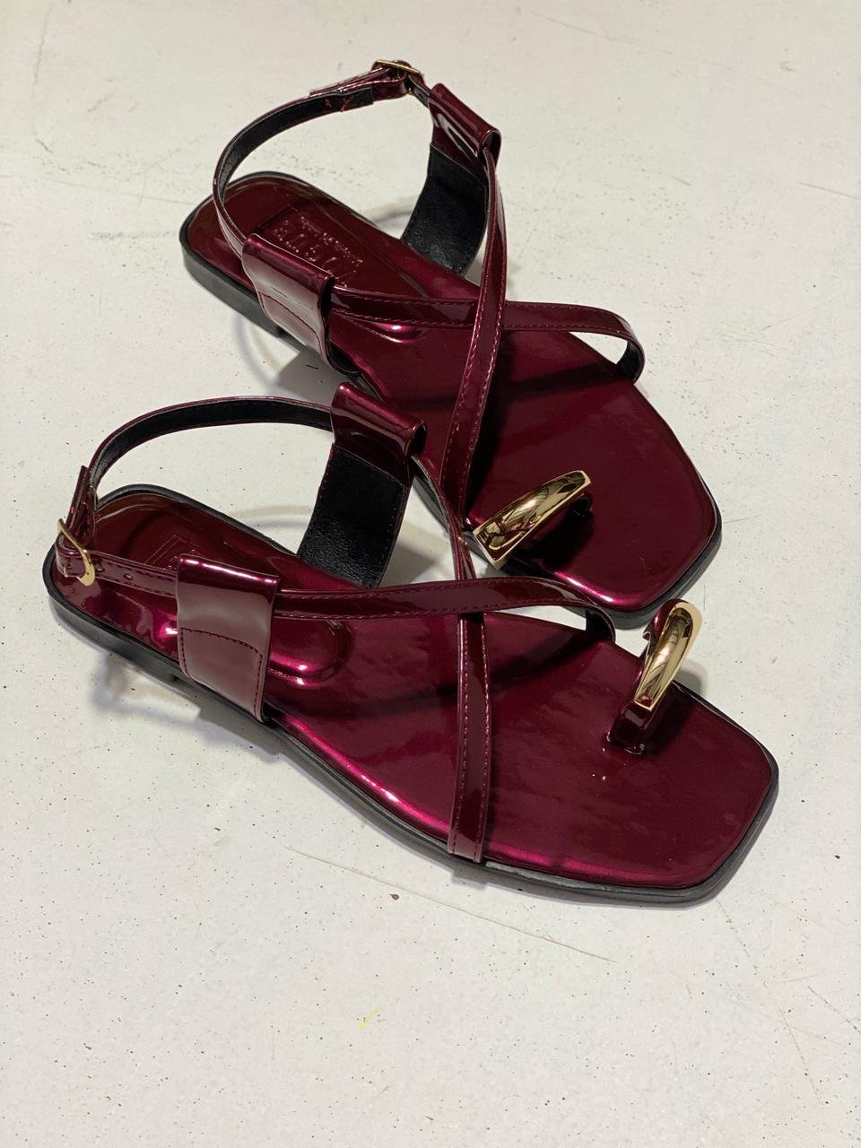 Stella Gold toe ring cross flat sandal